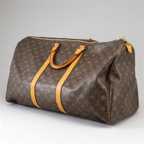 louis vuitton weekend travel bag|authenticate louis vuitton bag.